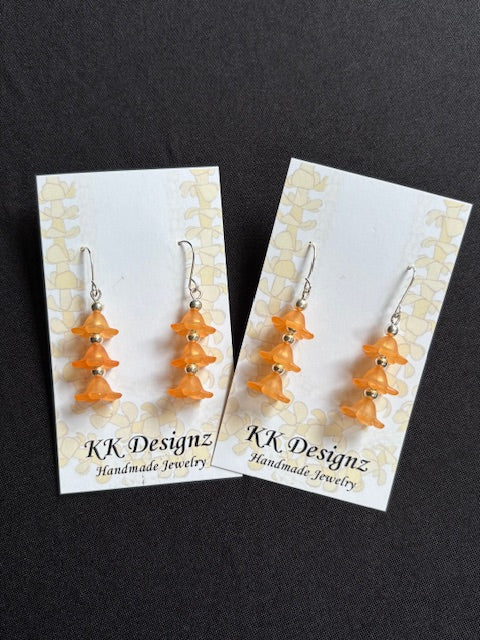 Orange Puakenikeni Dangle on Silver